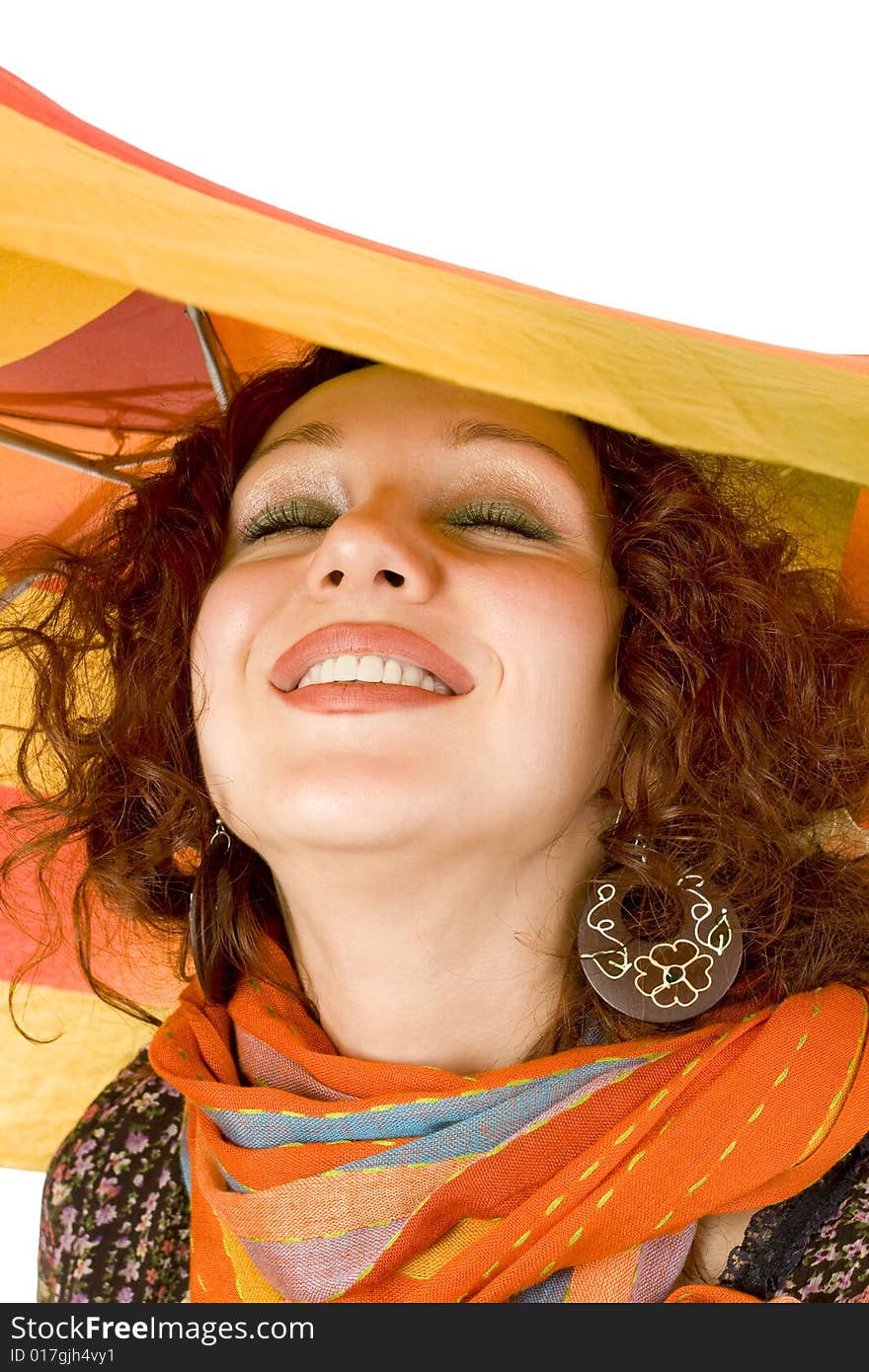 Closeup portrait of a smiling girl with colorful umbrella. Closeup portrait of a smiling girl with colorful umbrella