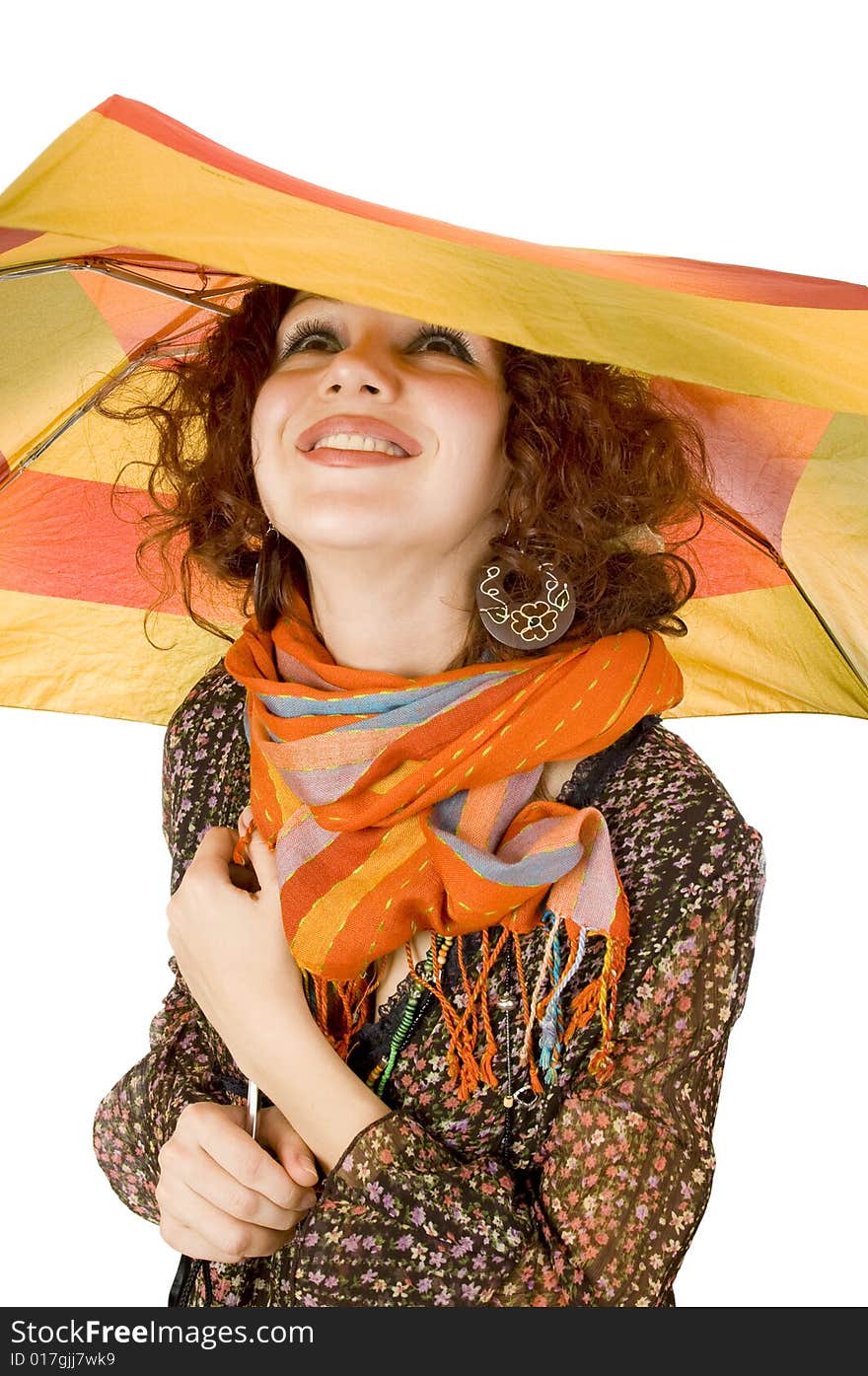 Closeup portrait of a smiling  girl with colorful umbrella. Closeup portrait of a smiling  girl with colorful umbrella