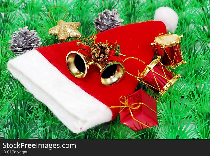 Santa hat image on the green gras background