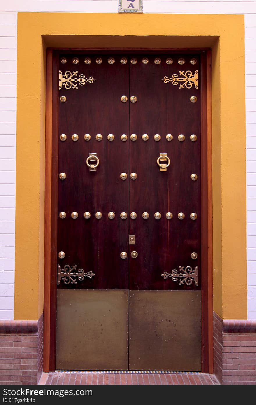 A wood door, with metal ornement, Sevilla. A wood door, with metal ornement, Sevilla