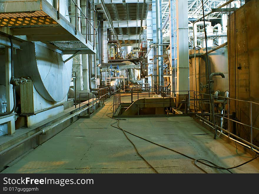 Pipes, tubes, machinery and steam turbine at a power plant