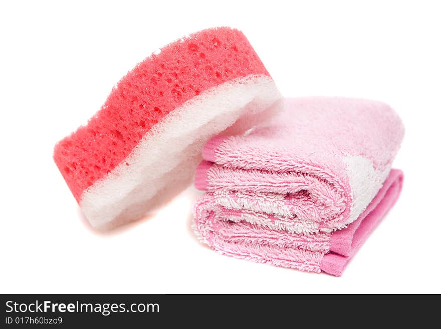 Pink towel isolated on white background