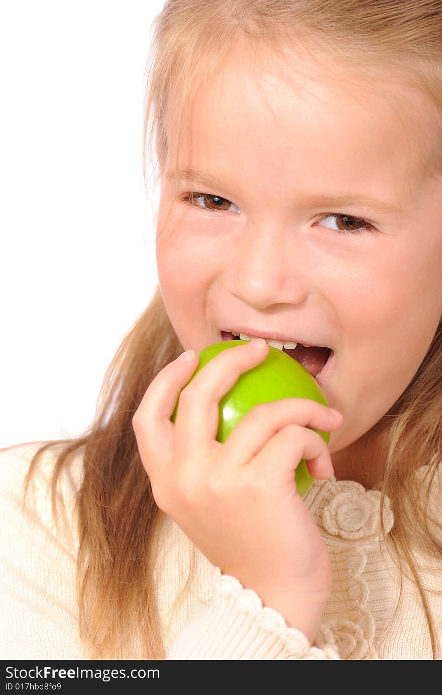 Little girl with juicy green apple. Little girl with juicy green apple