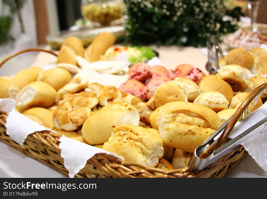 Basket of bread on table for breakfast