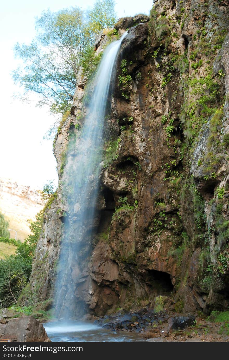 Honey Falls in mountains on Caucasus