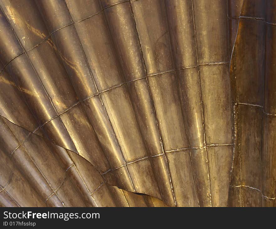 Close up of the metal which forms part of a large costal sculpture. Close up of the metal which forms part of a large costal sculpture.