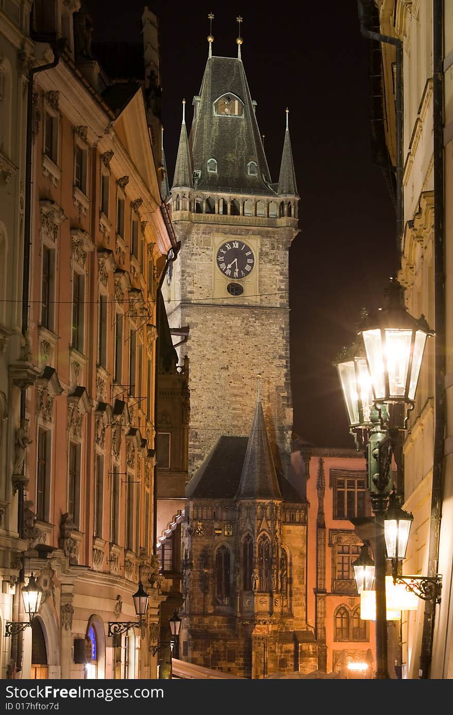 Tower of Old Town Hall on Old Town Square in Prague at night lighting.