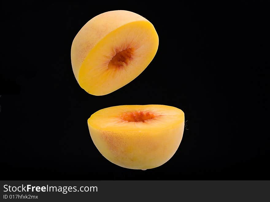 Fresh peaches isolated on a white background