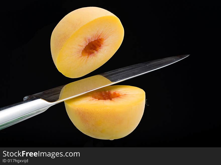 Fresh peaches isolated on a white background