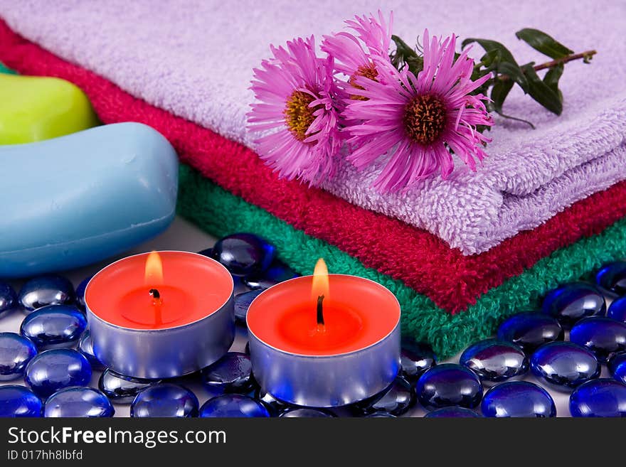 Colourful towels, aroma candles,organic soap and flowers . Colourful towels, aroma candles,organic soap and flowers .