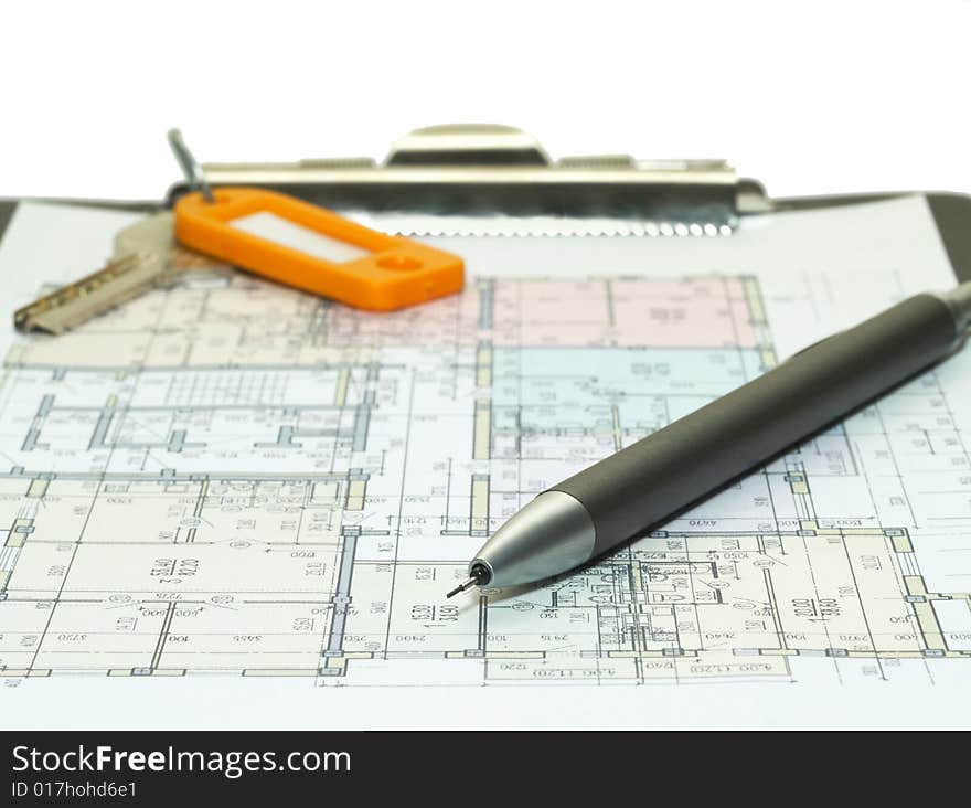 Blueprint of house plans and pancil