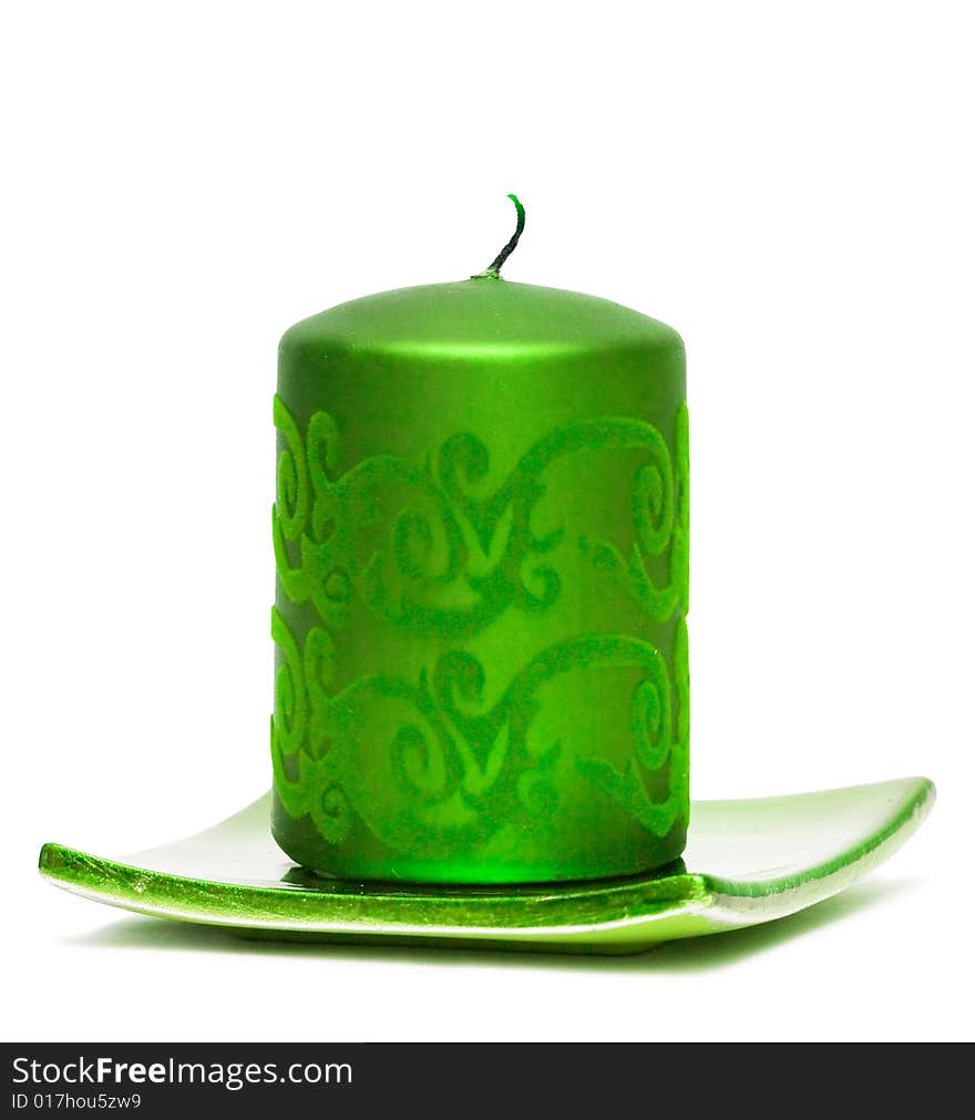 Green burning candle