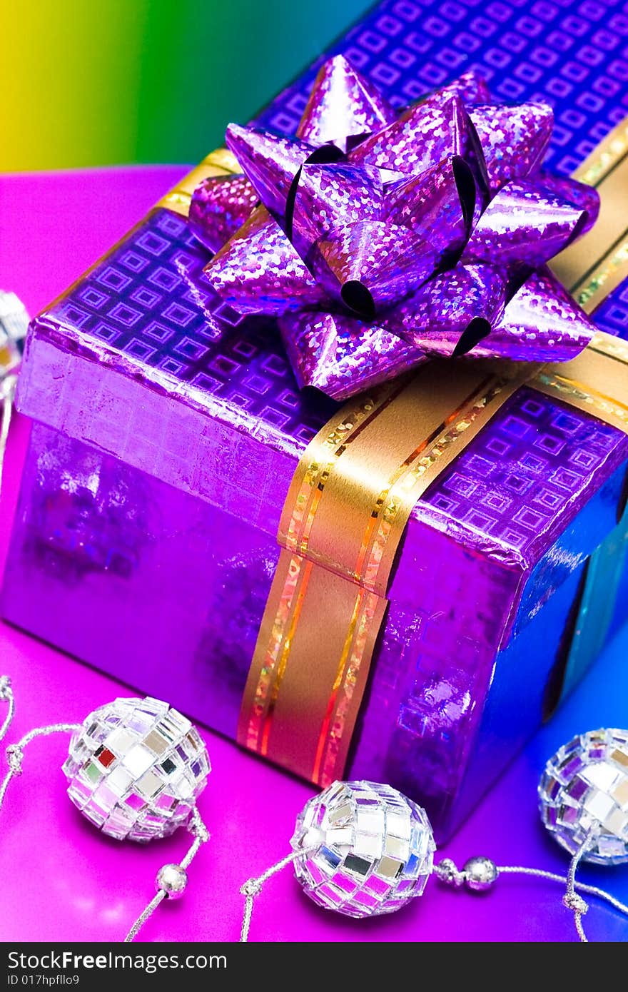 Gift box on violet background