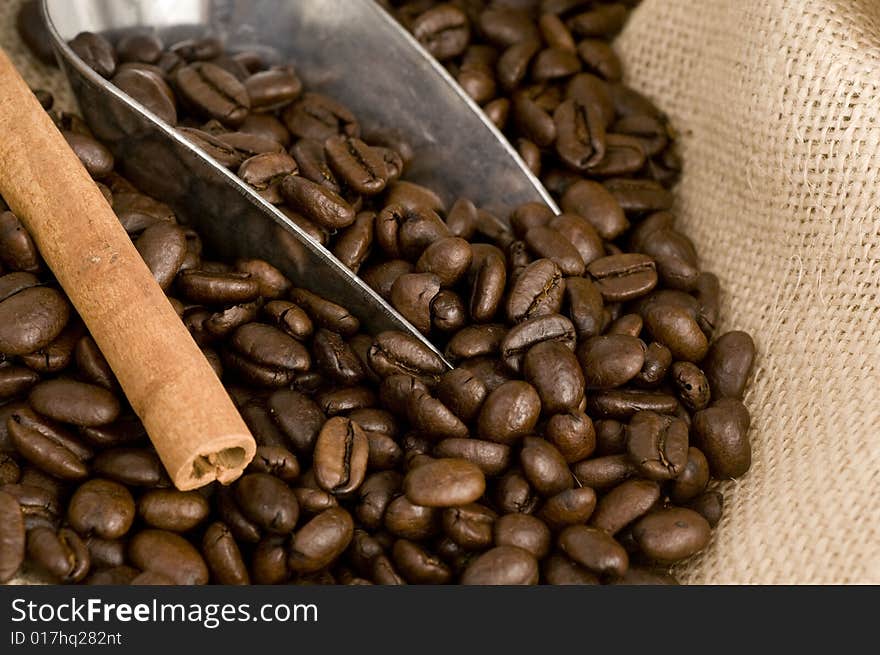 Coffee beans and silver shovel