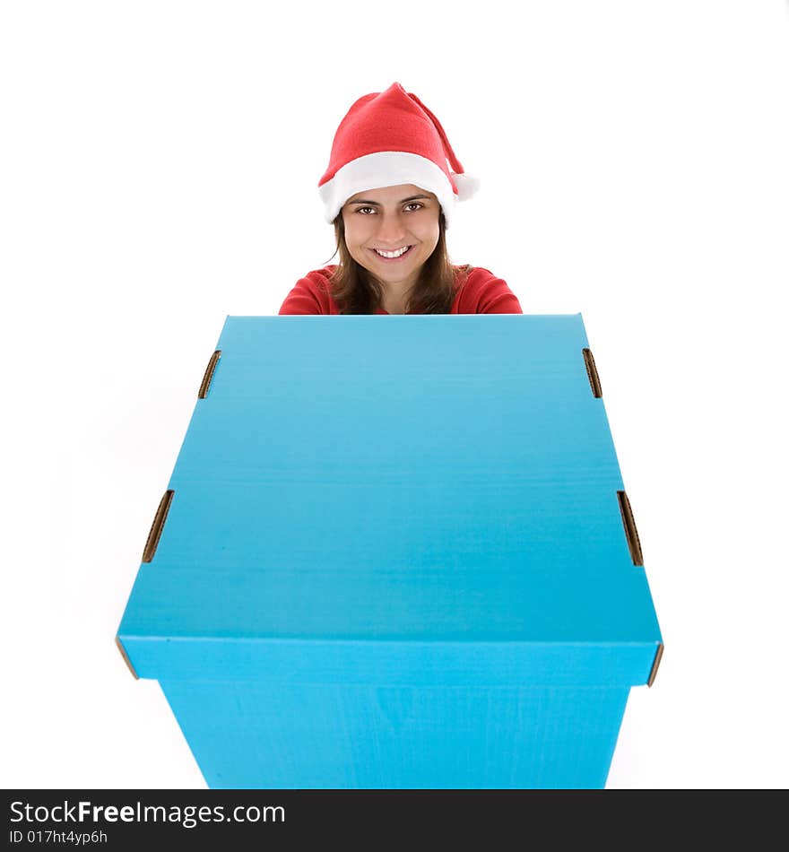 Christmas concept with young santa woman holding giant blue present box isolated on white background