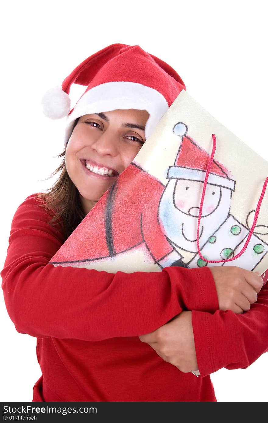 Happy young santa woman in red clothing holding present bag in her hands. isolated on white background. Happy young santa woman in red clothing holding present bag in her hands. isolated on white background.