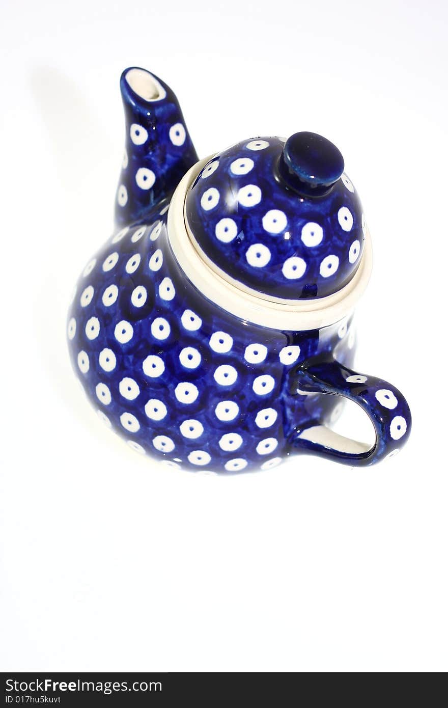 Blue pot for tea, white background