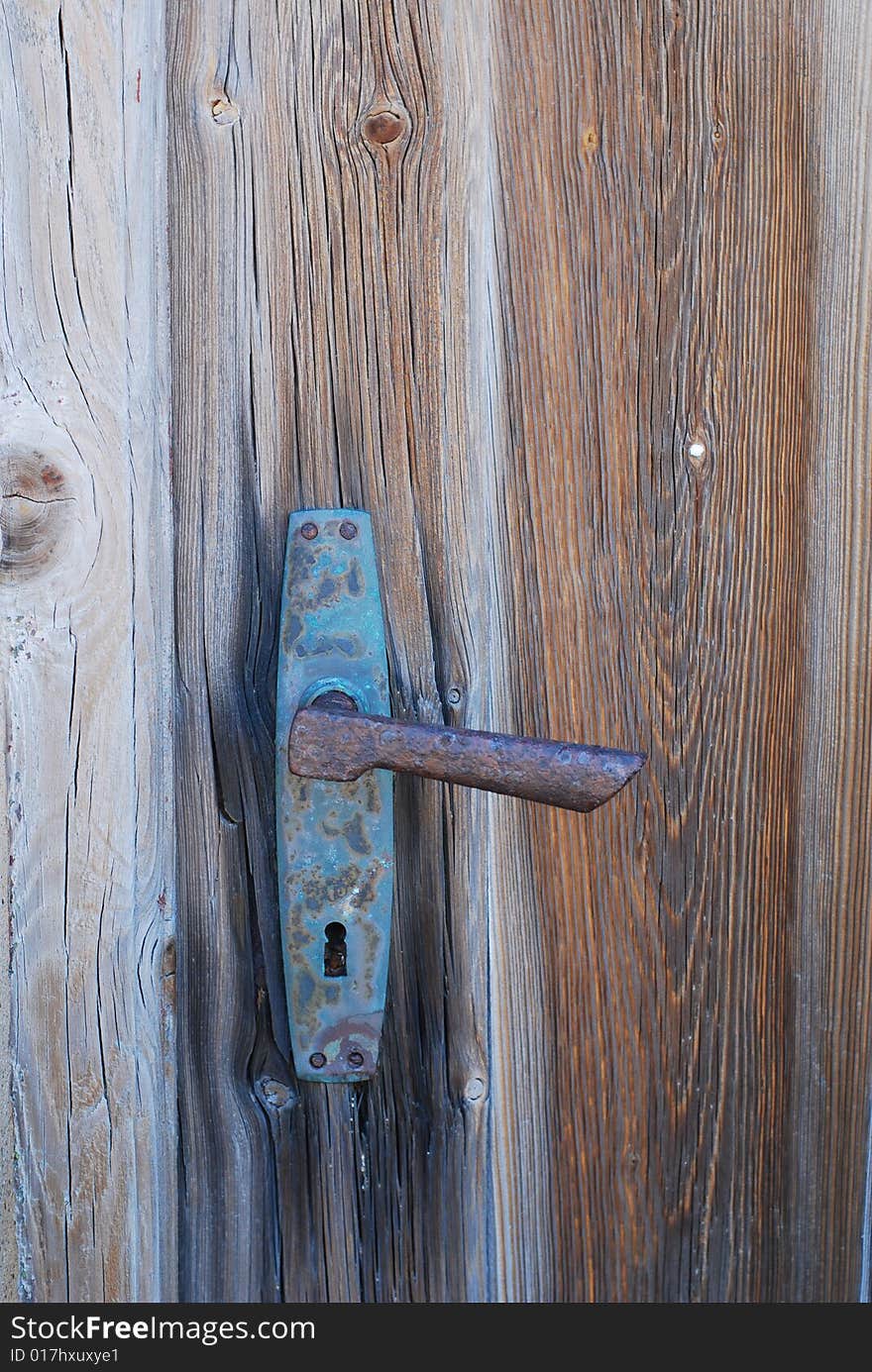 The old rusted door handle