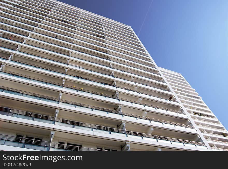 apartment block in front of blue sky