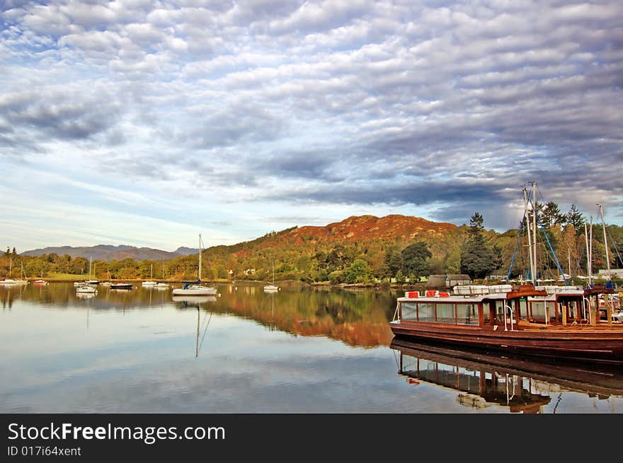 Boats on the scottish lake in  the morning