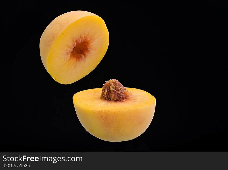 Fresh peaches isolated on a white background