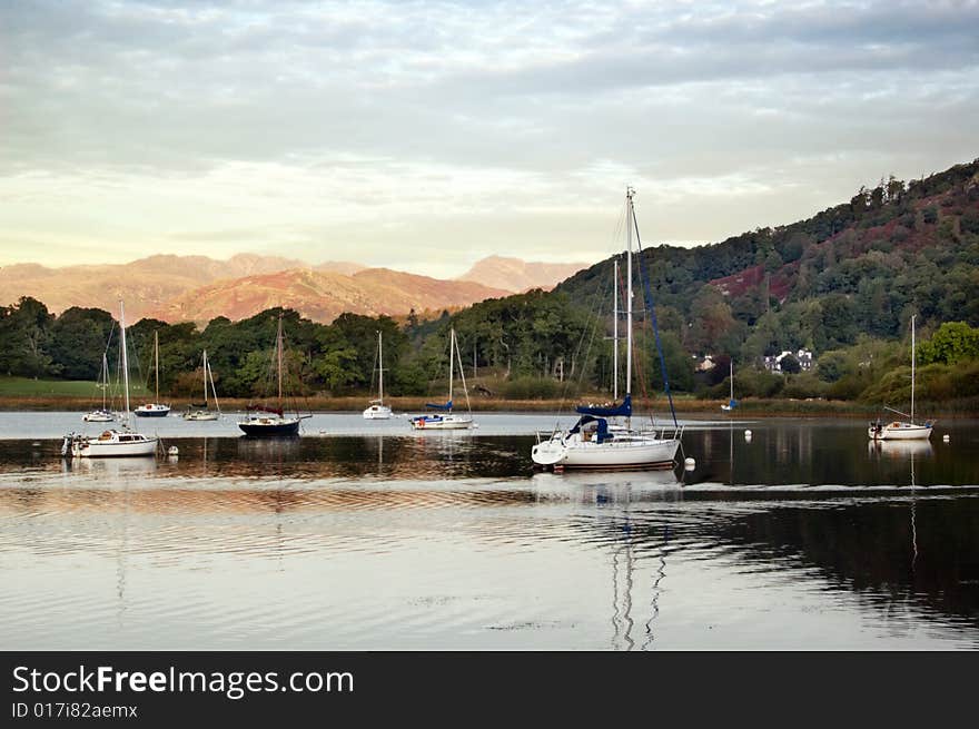 Sailboats on the scottish lake in the morning