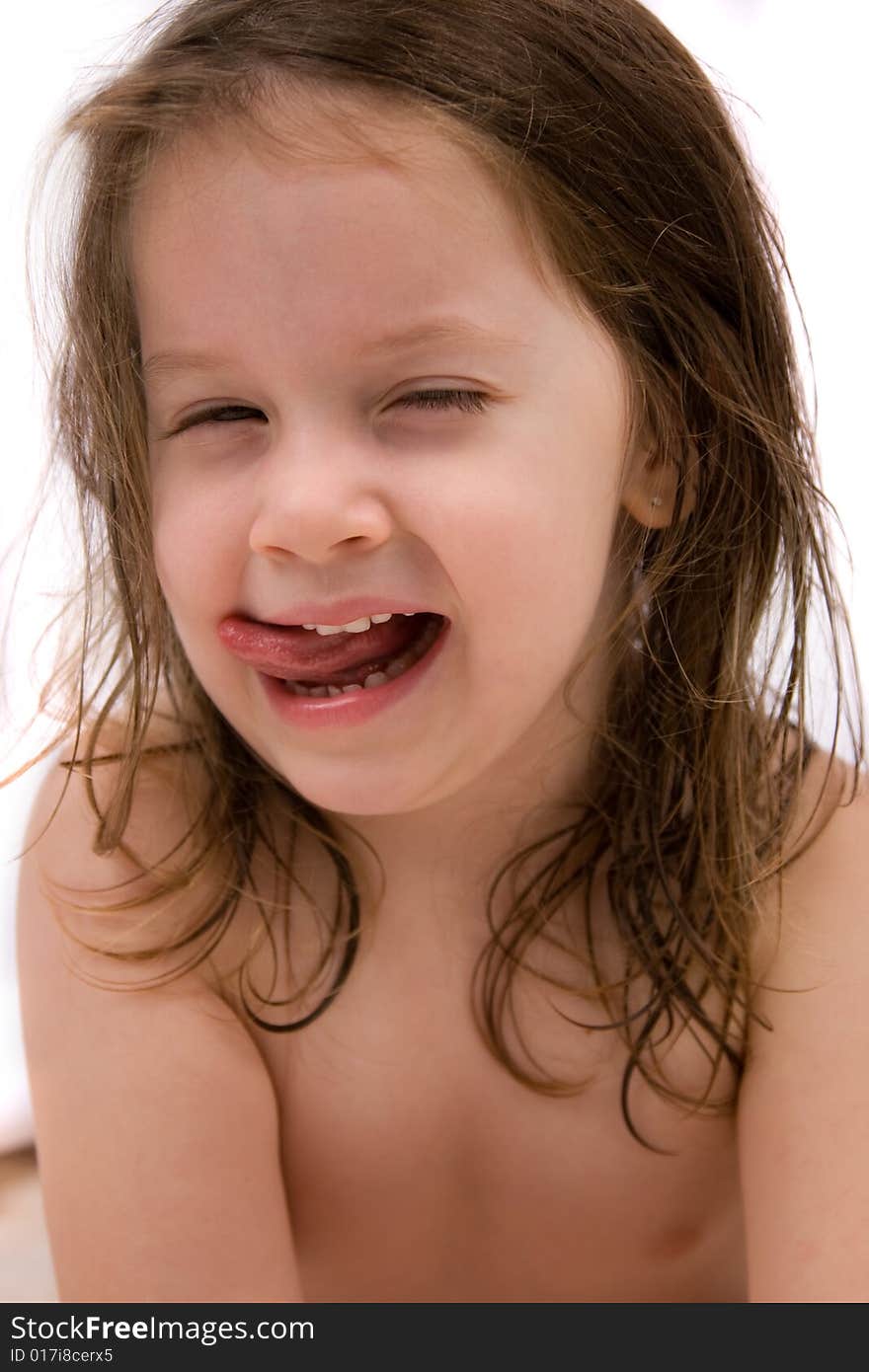 Little girl with close eyes and open mouth