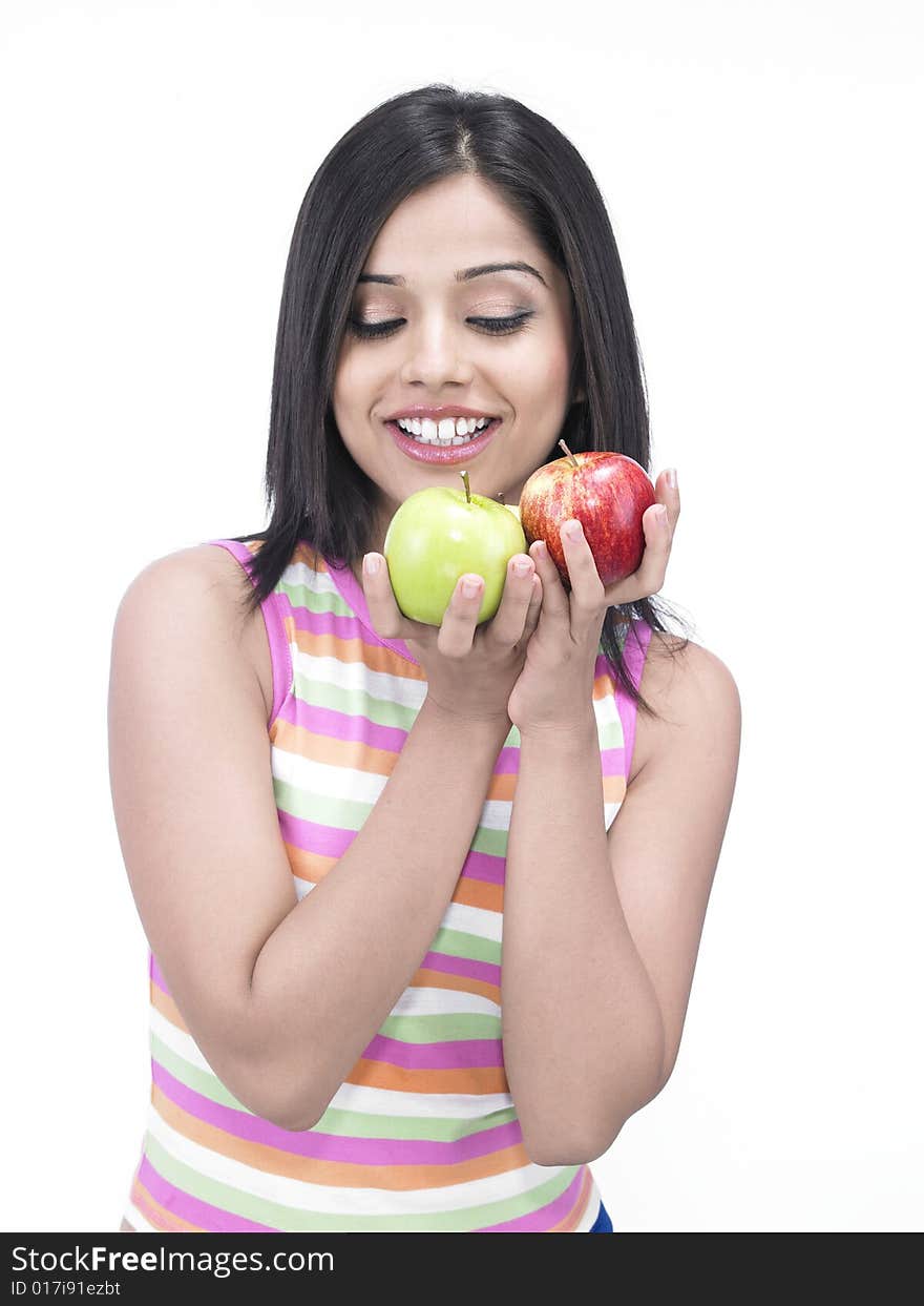 Asian woman with one green and one red apple. Asian woman with one green and one red apple