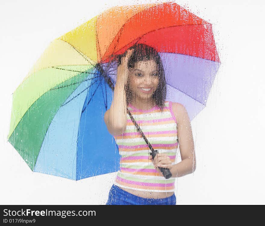 Asian girl with rainbow umbrella