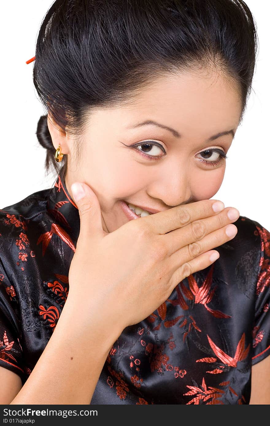 The asian woman in a shy smile. The asian woman in a shy smile