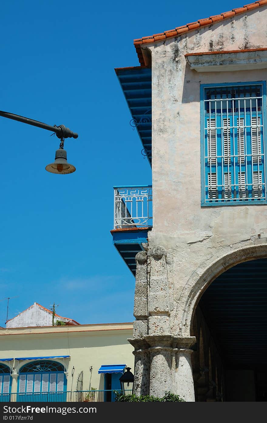 Detail of typical Old Havana building against blue sky. Detail of typical Old Havana building against blue sky