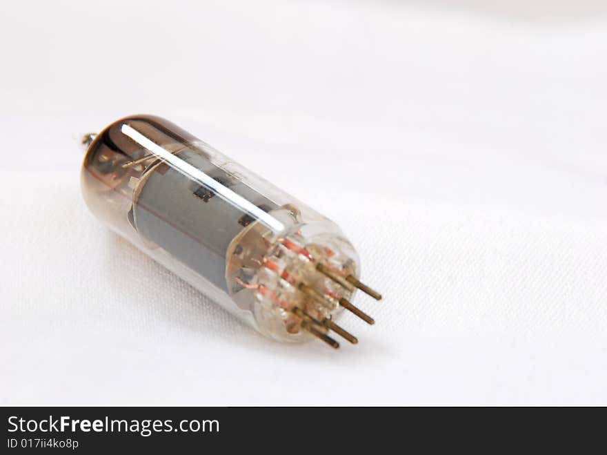 Vacuum radio tube on white background. Vacuum radio tube on white background