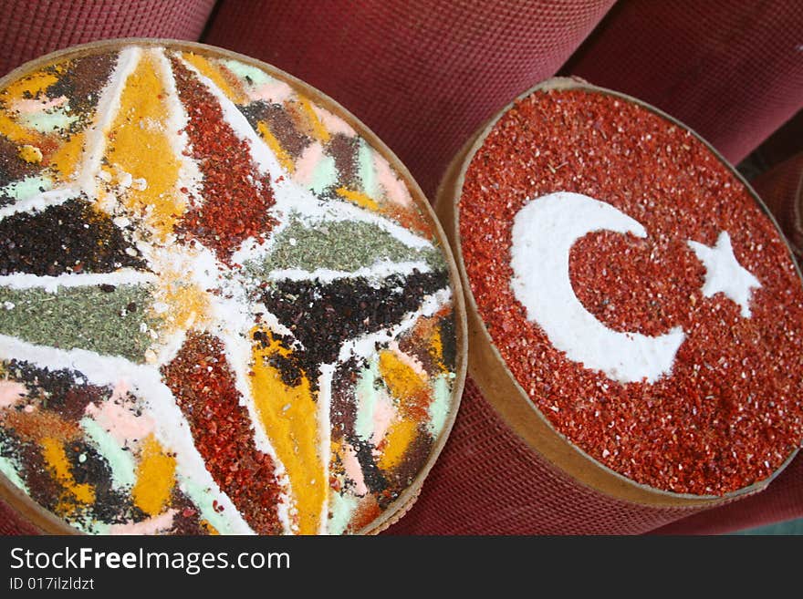 Assortment of different spices in a bag on a market