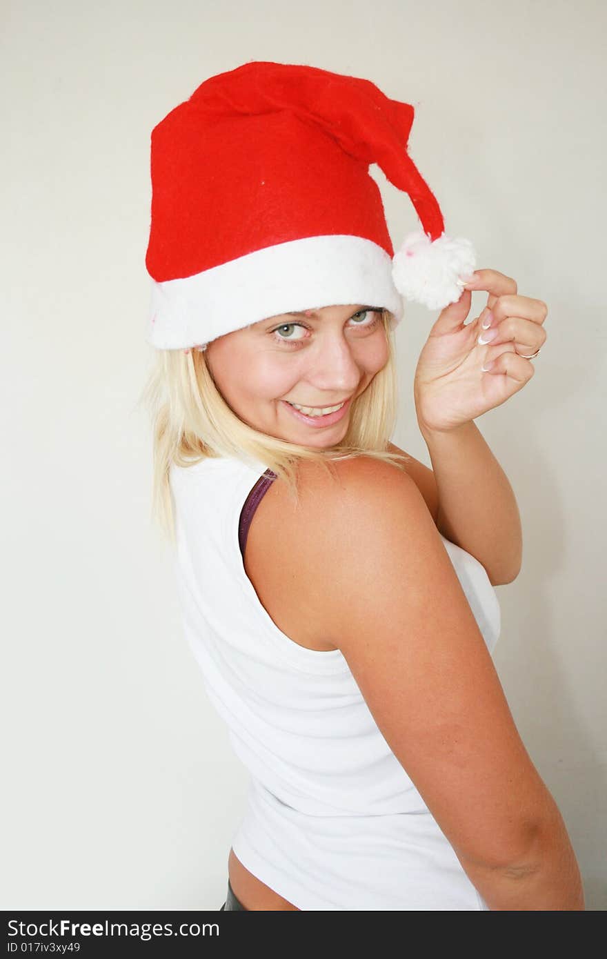 Beautiful woman wearing santa hat