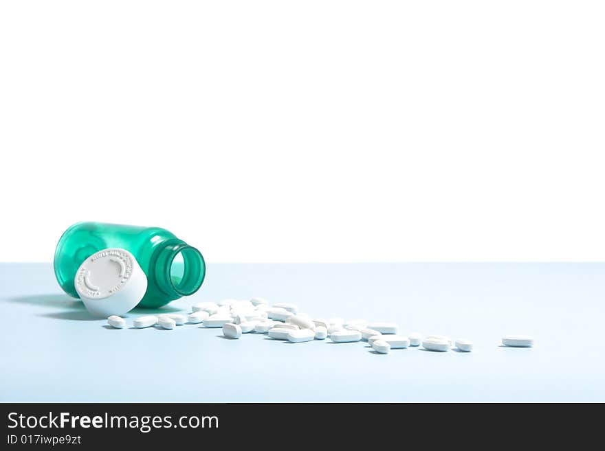 A bottle filled with pills