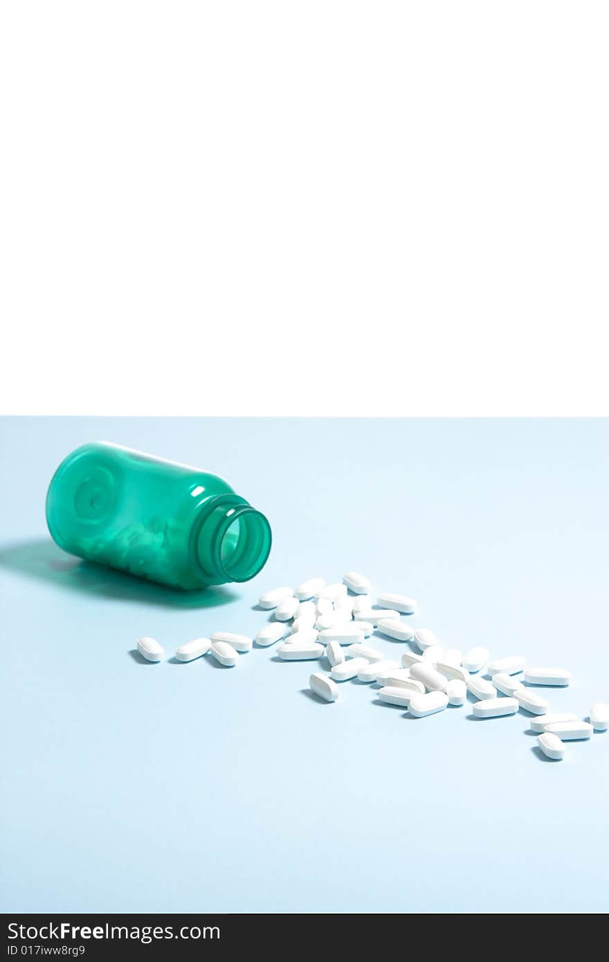 A bottle filled with pills