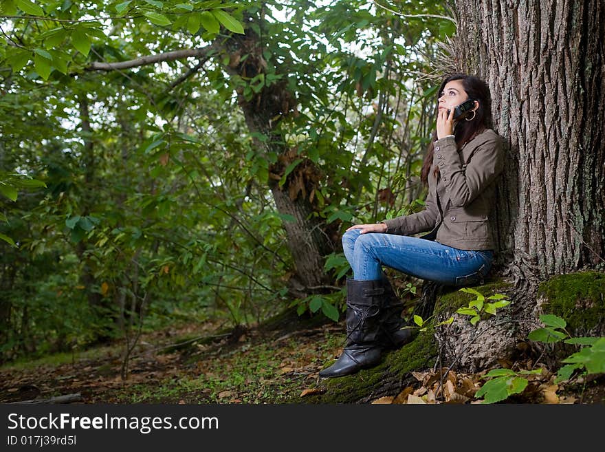 Young woman on autumn forest under chestnut tree. Young woman on autumn forest under chestnut tree