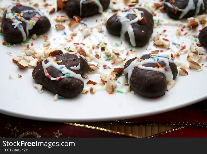 Some christmas cockie on a plate with white chocolate. Some christmas cockie on a plate with white chocolate