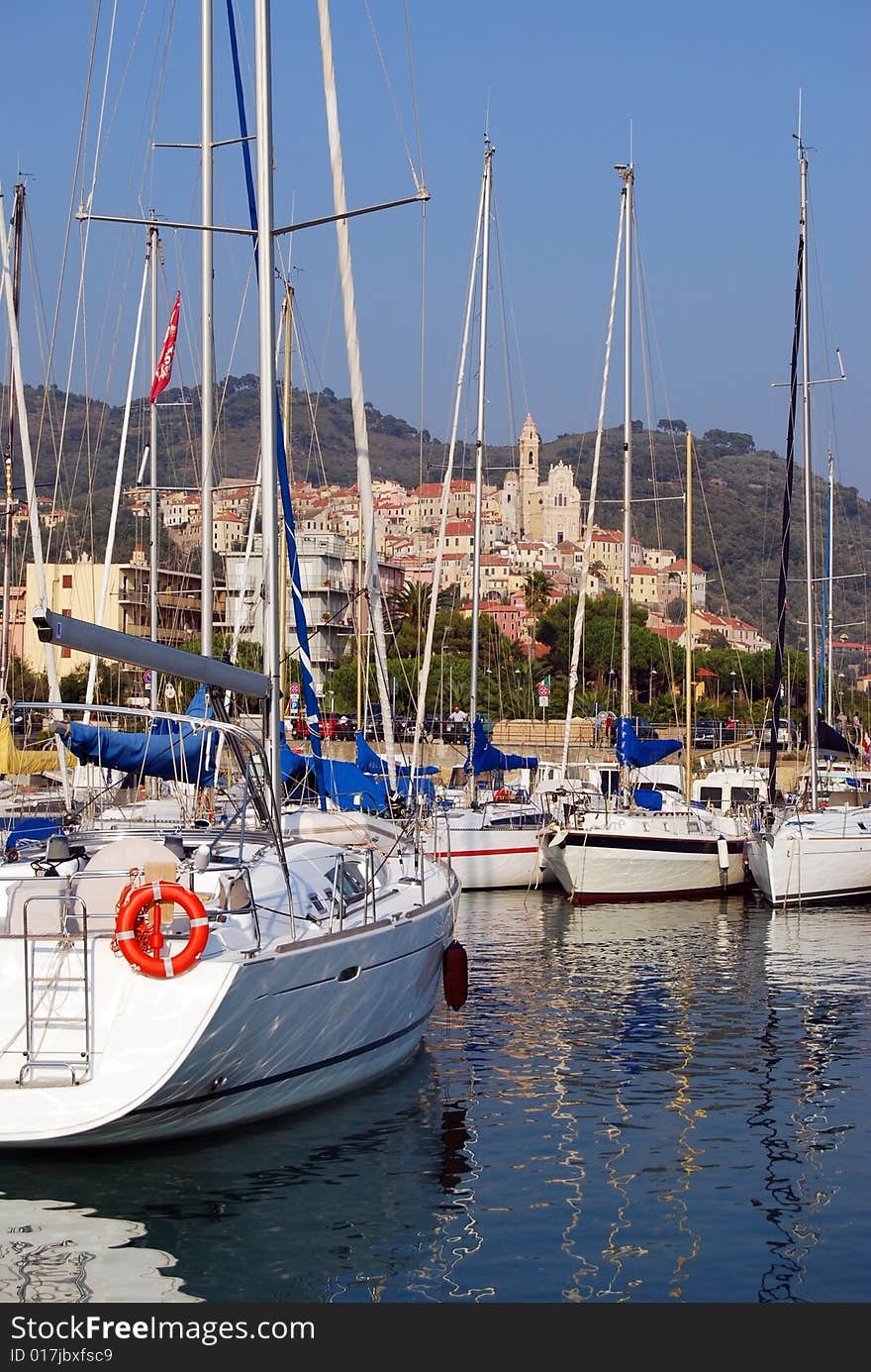 View of Cervo, medieval village in Liguria, Italy from the little harbour of San Bartolomeo.