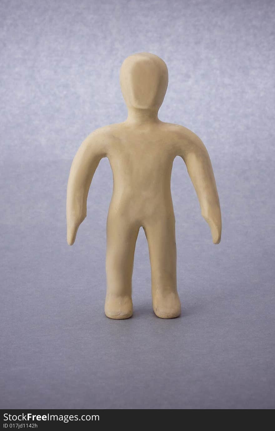 Plasticine man figure close-up isolated