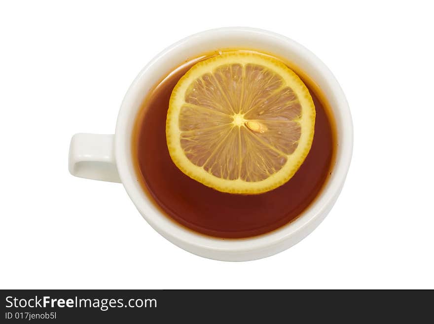 Cup with tea and a lemon on a white background. Cup with tea and a lemon on a white background