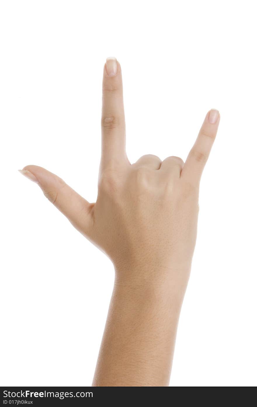 Hand showing rock on on an isolated white background. Hand showing rock on on an isolated white background