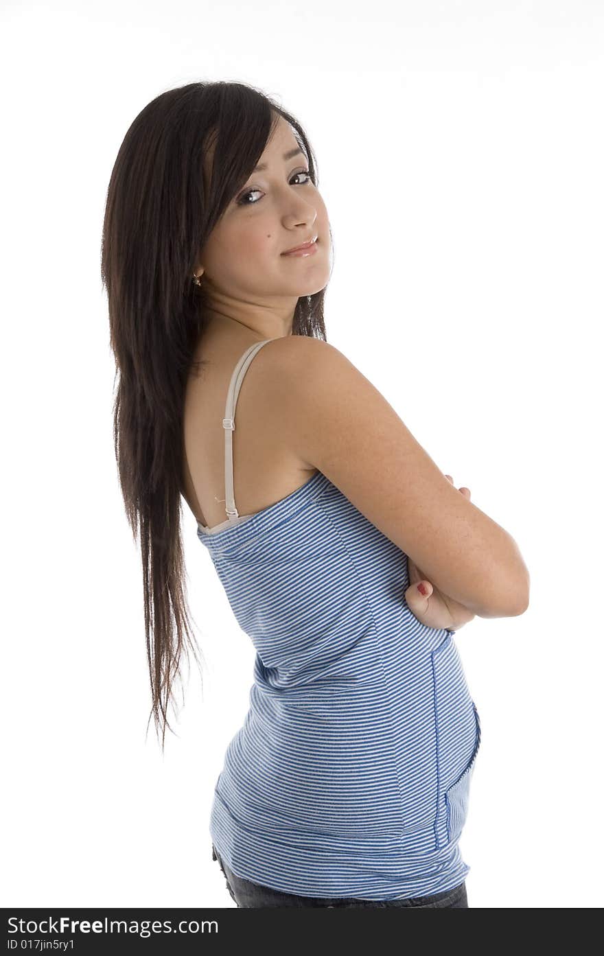 Beautiful teen with folded hands looking sideways on  an isolated white background