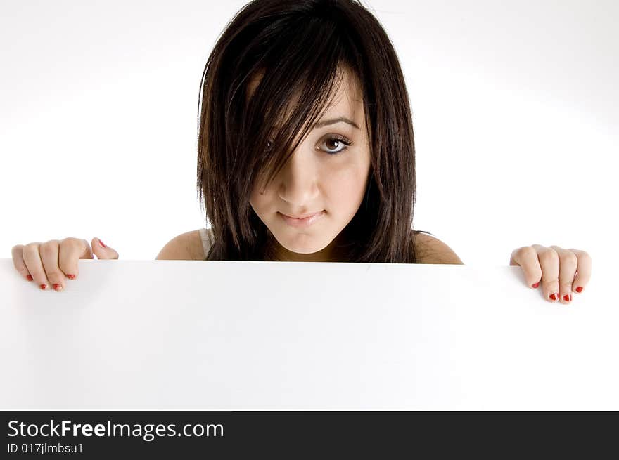 Portrait of girl holding placard on  an isolated white background