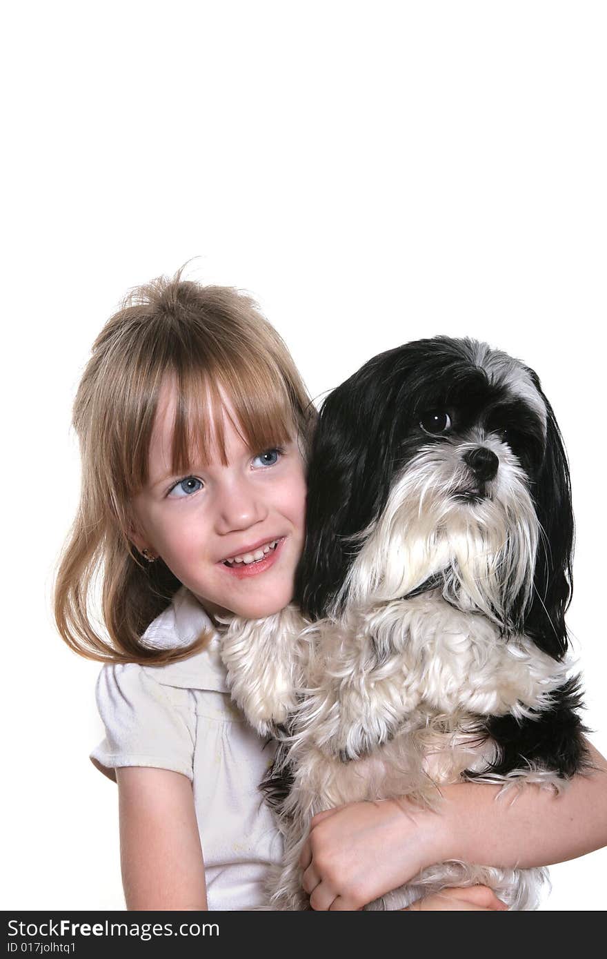 A four year old girl with her dog. A four year old girl with her dog