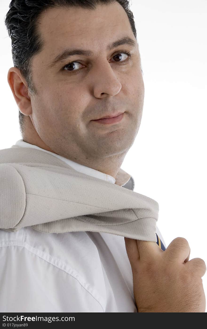 Mature businessman posing with coat on  an isolated white background