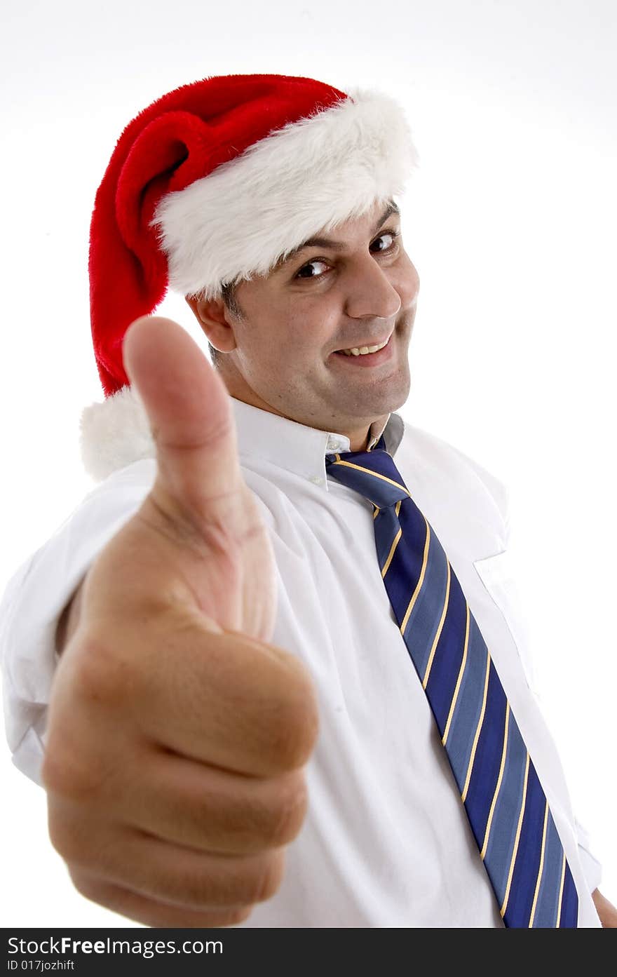 Smiling businessman with christmas hat showing approval sign on  an isolated white background