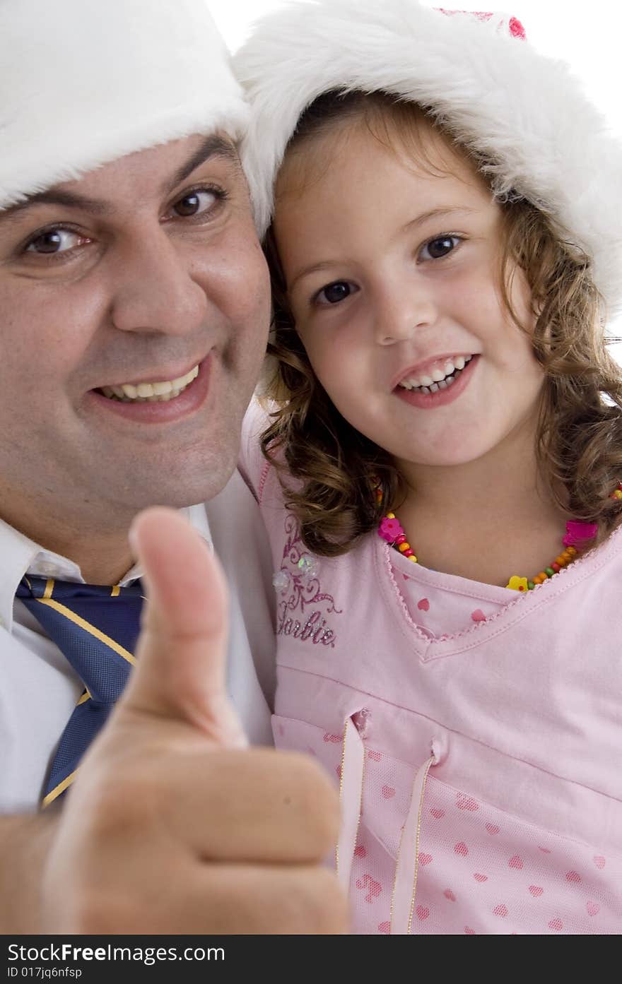 Father and daughter with christmas hat