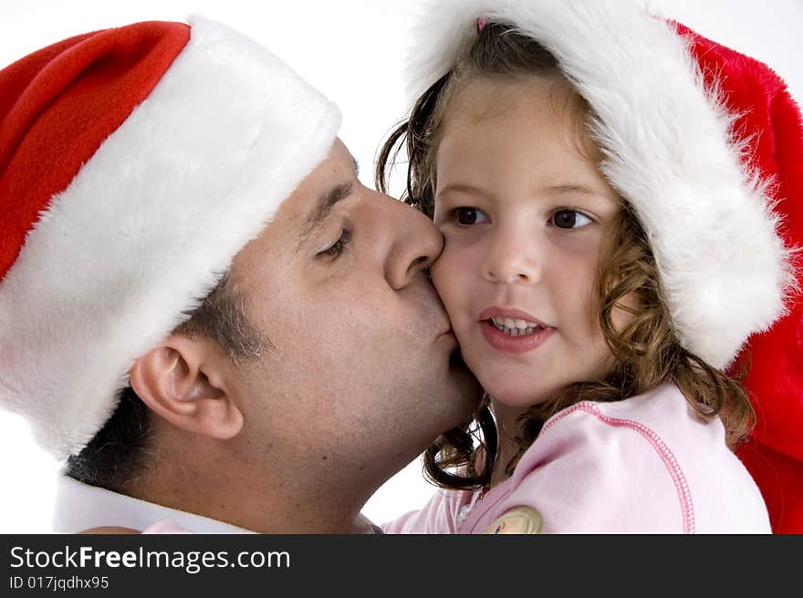 Father kissing his daughter