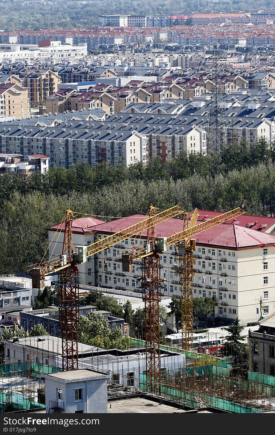 Large-scale residential area of city in construction. In Beijing China. Large-scale residential area of city in construction. In Beijing China.